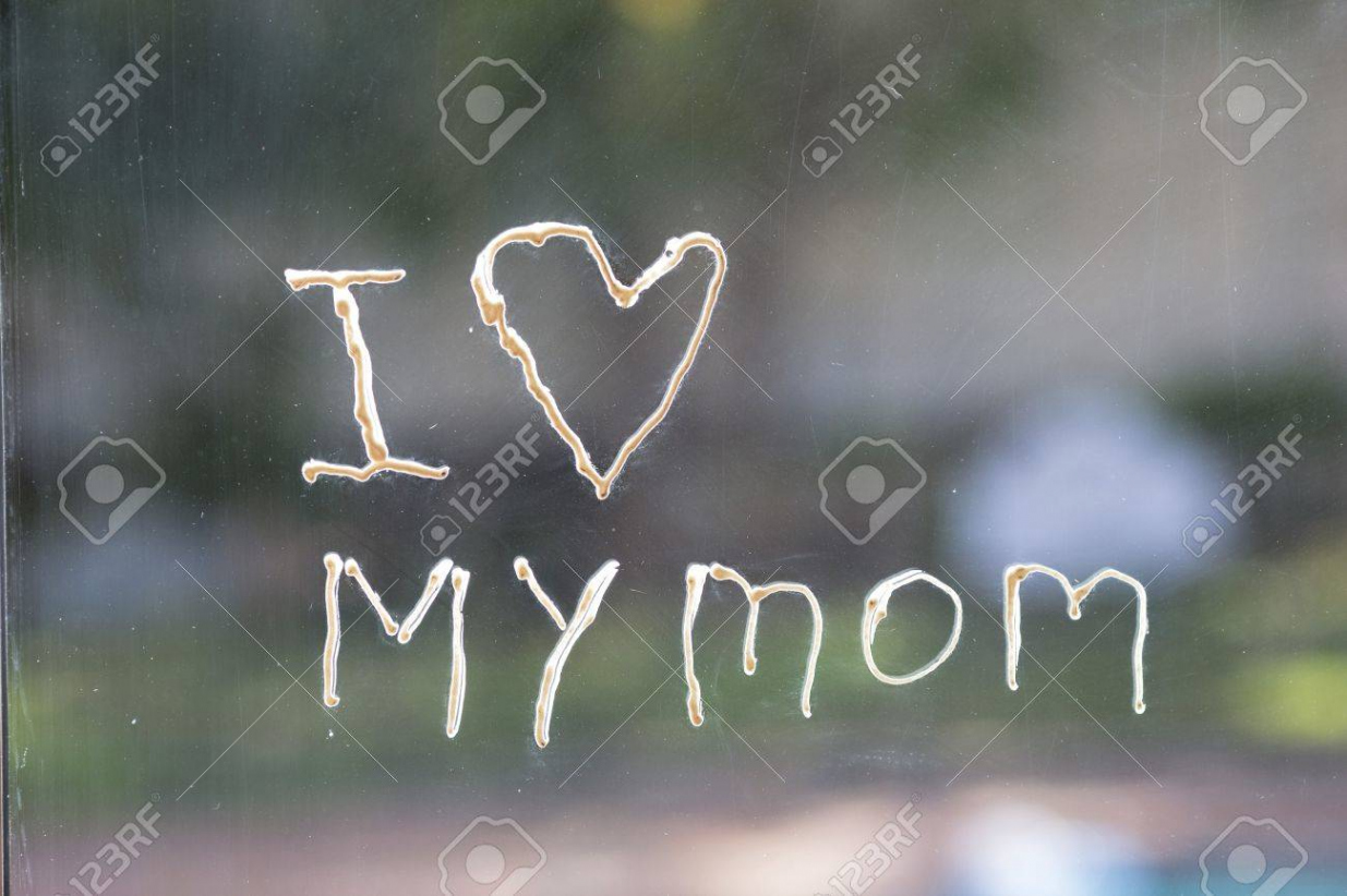 Authentic Child&#;s Graffiti "I Love My Mom" On A Household Window