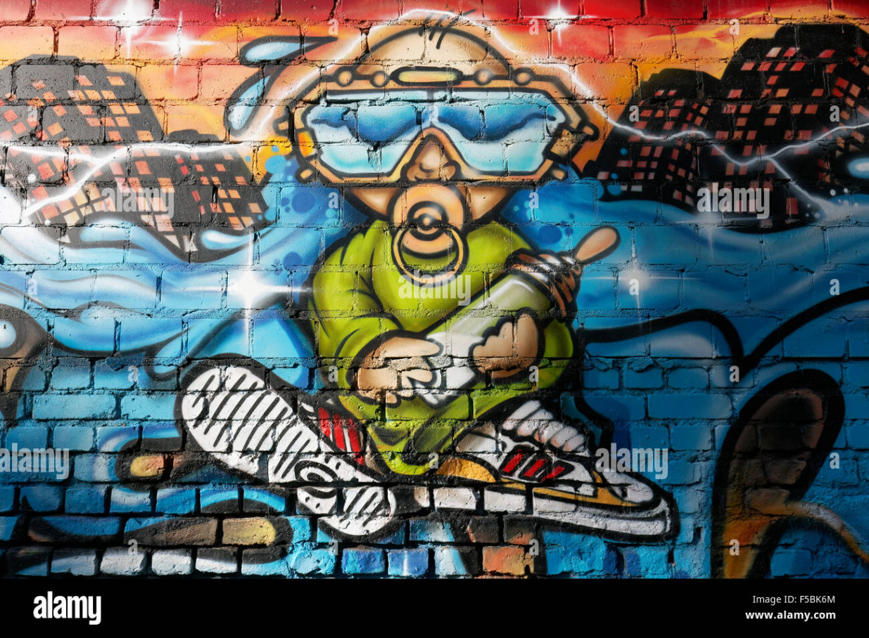 Baby with pacifier, diving goggles and bottle of milk, graffiti