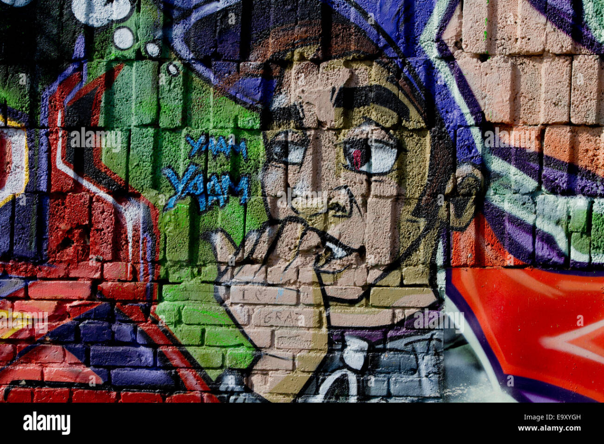 Berlin wall graffiti cartoon character hi-res stock photography