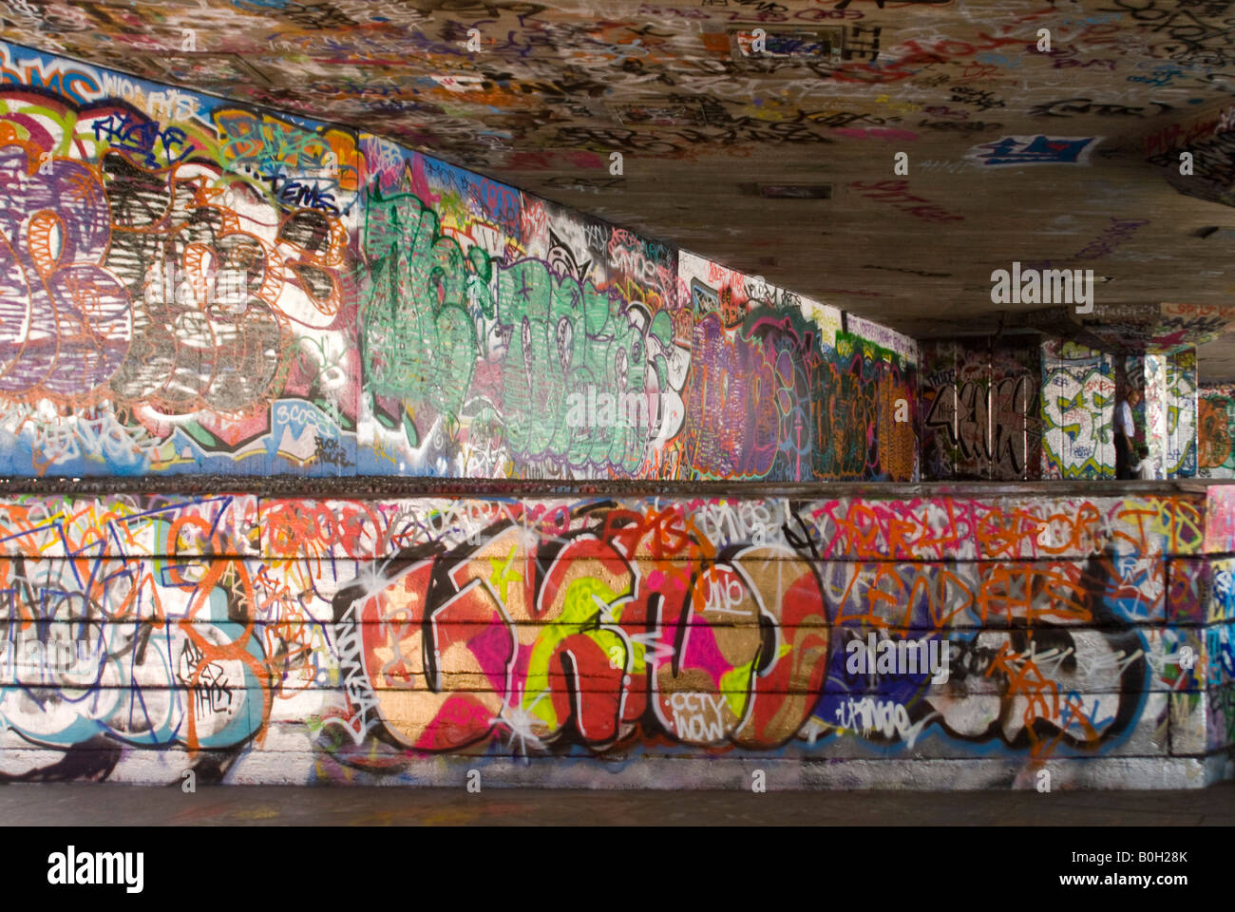 Horizontal close up of colourful graffiti art covering the walls