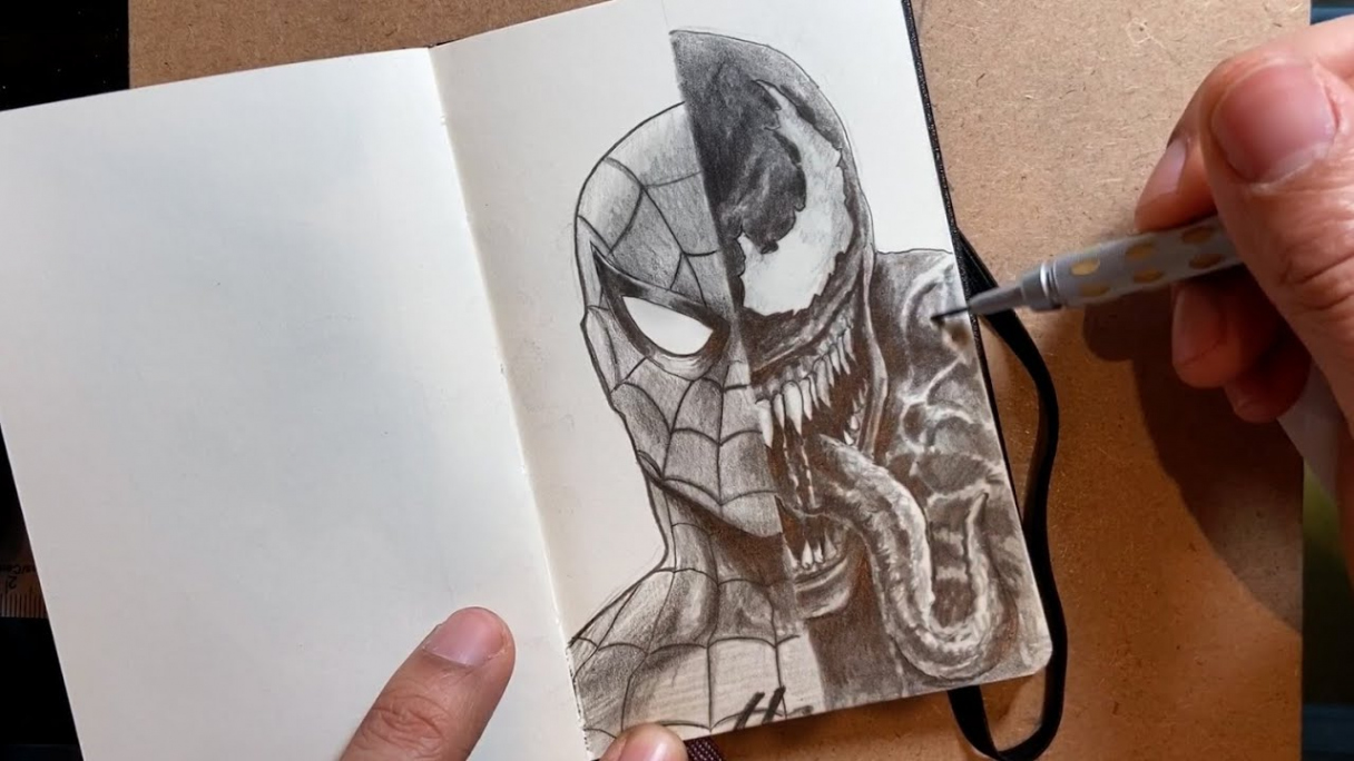 Drawing SPIDERMAN and VENOM split in my MOLESKINE sketchbook