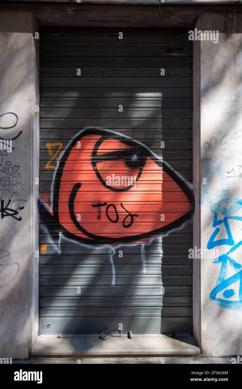 Graffiti on door shutter street hi-res stock photography and