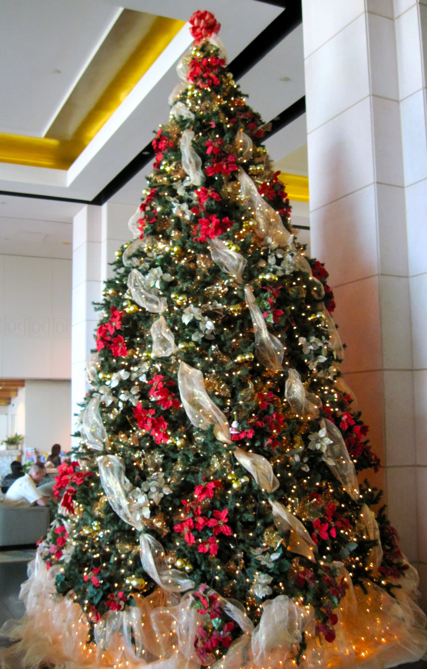 I love the lit white tulle underneath the Christmas Tree  Ribbon