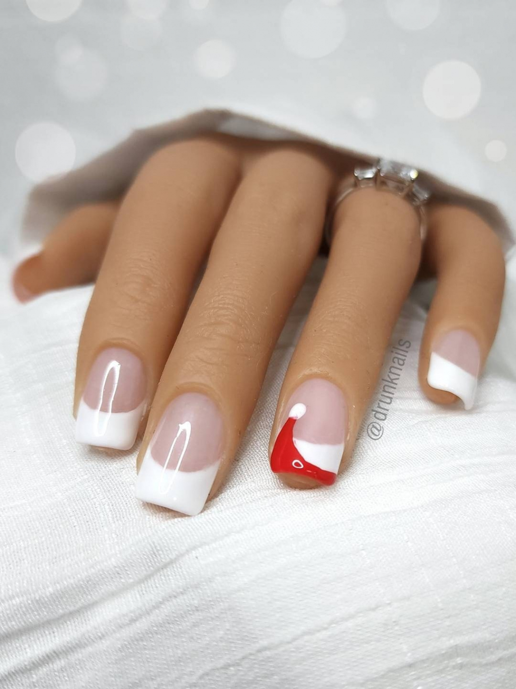 White French Tip Nails With Red Santa Hat Christmas Nail Art